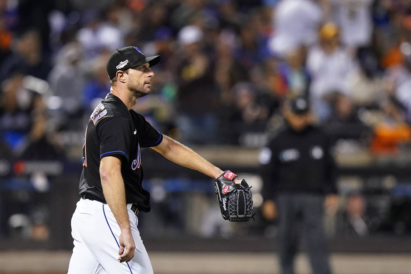 Mets starting pitcher Max Scherzer reacts after giving up a three-run home run to Padres left fielder Jurickson Profar during the fifth inning of Game 1 of a National League wild-card series Friday in New York. The Padres won 7-1.