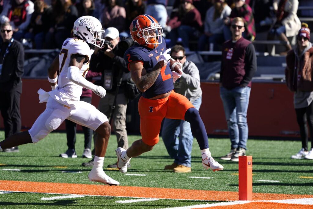 Chase Brown and a stingy defense carry Illinois to a 26-14 win against Minnesota, making the Illini bowl eligible