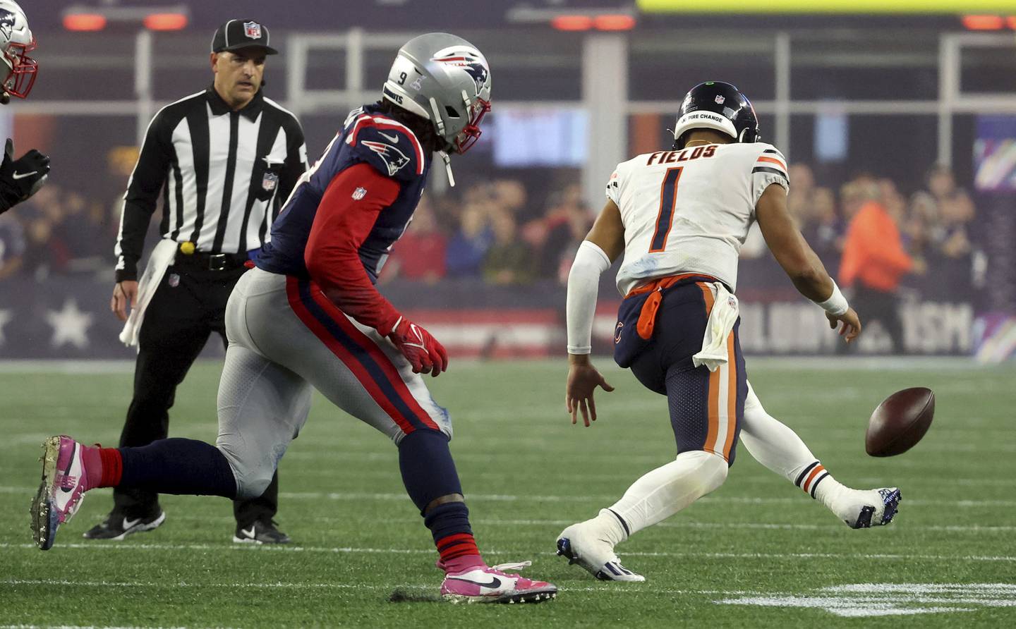 Bears quarterback Justin Fields fumbles the ball in the second quarter against the Patriots on Monday, Oct. 24, 2022, at Gillette Stadium in Foxborough, Mass.