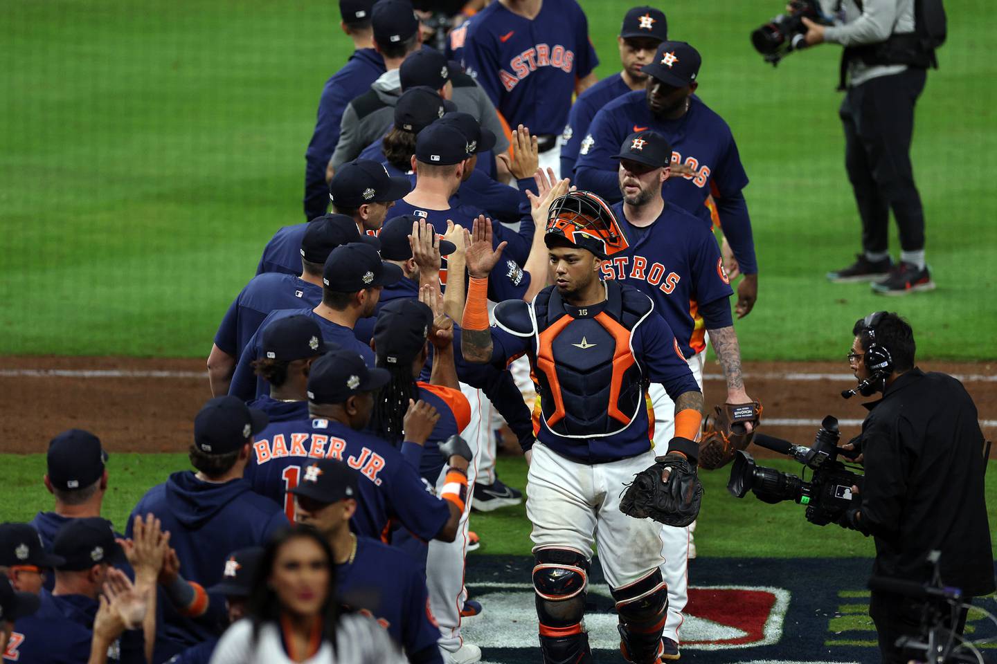 Astros players celebrate after a 5-2 win against the Phillies in Game 2 of the World Series on Saturday at Minute Maid Park in Houston.