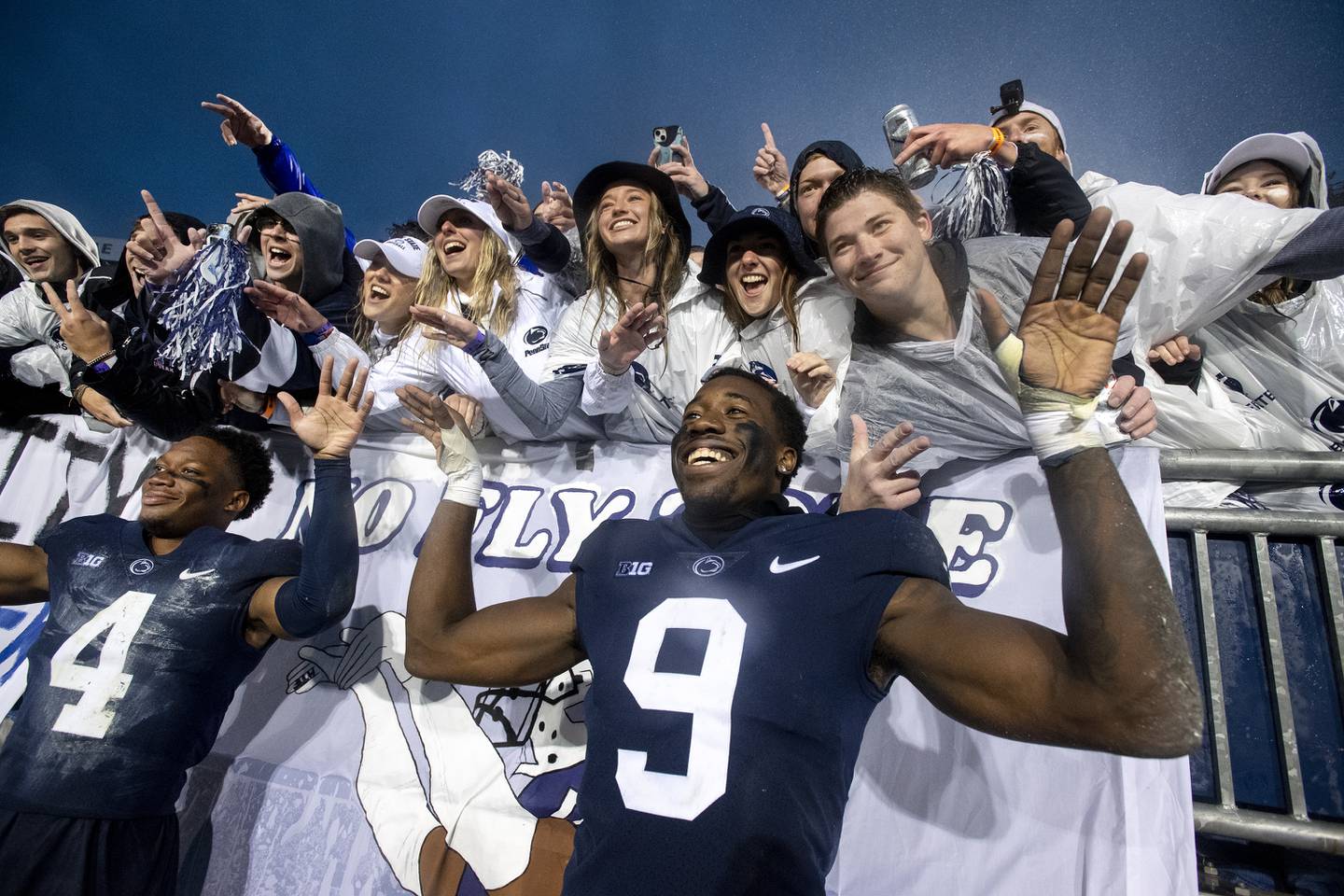 Penn State defenders Joey Porter Jr. (9) and Kalen King (4) celebrate with fans after a 17-7 win over Northwestern on Oct. 1, 2022, in State College, Pa.