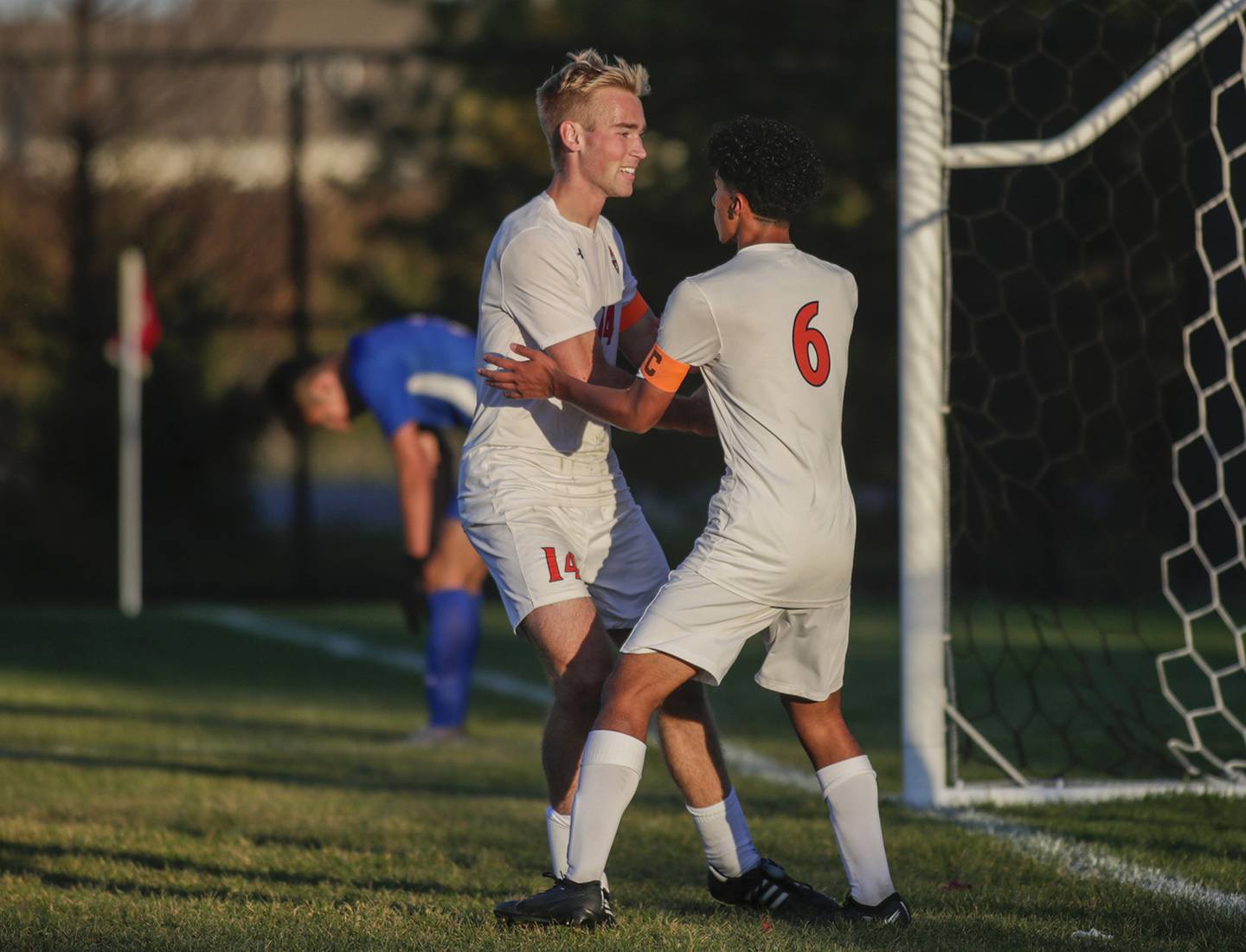 Oswego’s Salvador Martinez (6) celebrates with William Kalsto (14) celebrate after scoring a goal against Marmion during a nonconference game in Aurora on Wednesday, Oct. 12, 2022.