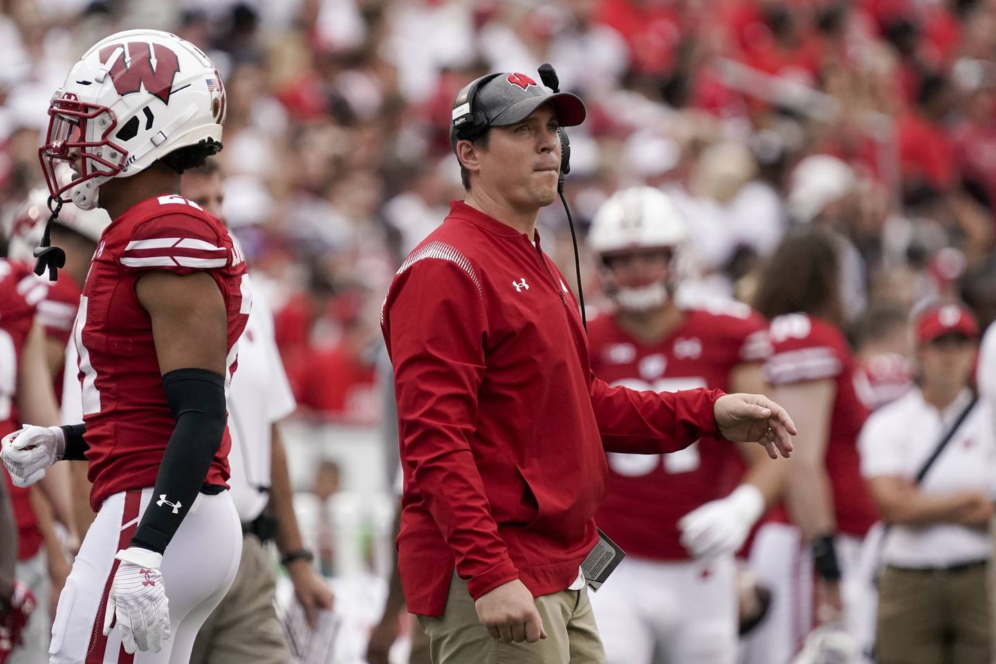 Wisconsin defensive coordinator Jim Leonhard looks on during a game against Penn State on Sept. 4, 2021.