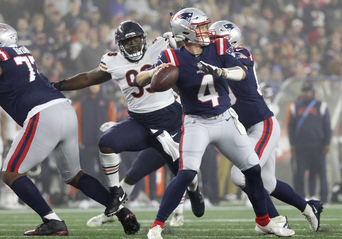 Bears defensive tackle Justin Jones eyes Patriots quarterback Bailey Zappe in the third quarter at Gillette Stadium on Oct. 24, 2022.