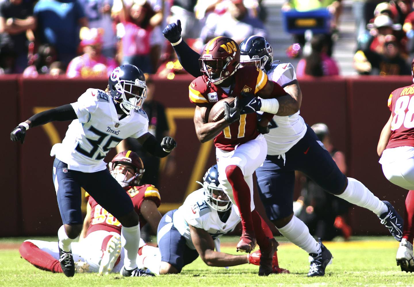 Commanders wide receiver Terry McLaurin (17) runs after making a catch against the Titans on Sunday in Landover, Md. 