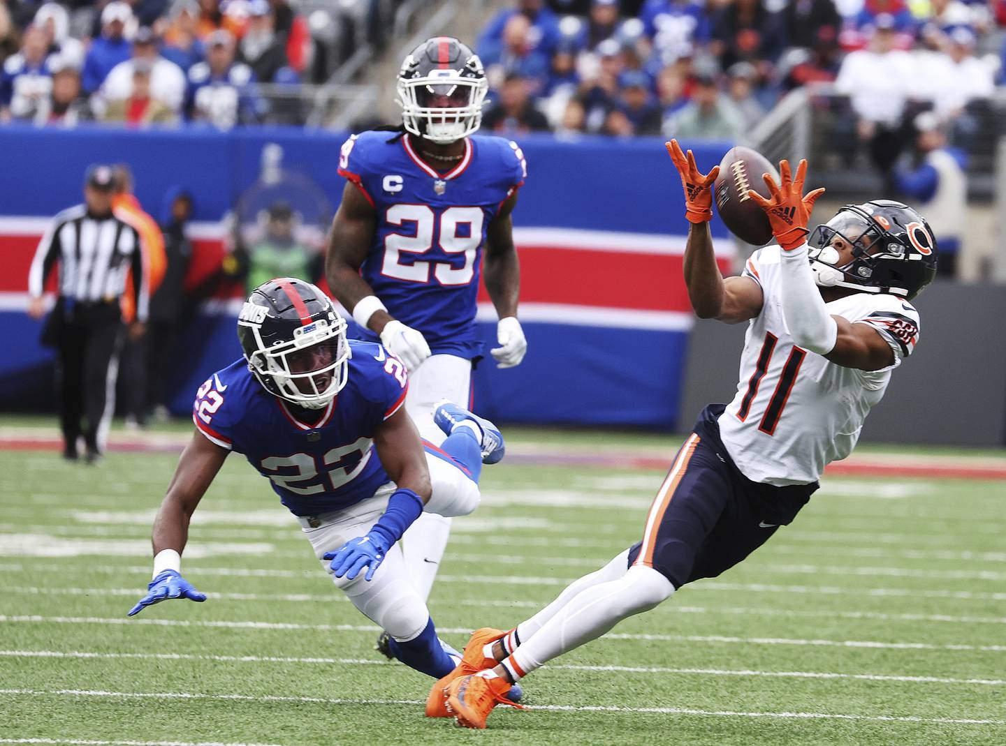 Bears receiver Darnell Mooney makes a catch during the first quarter against the Giants' Adoree' Jackson (22) on Oct. 2, 2022, at MetLife Stadium in East Rutherford, N.J.