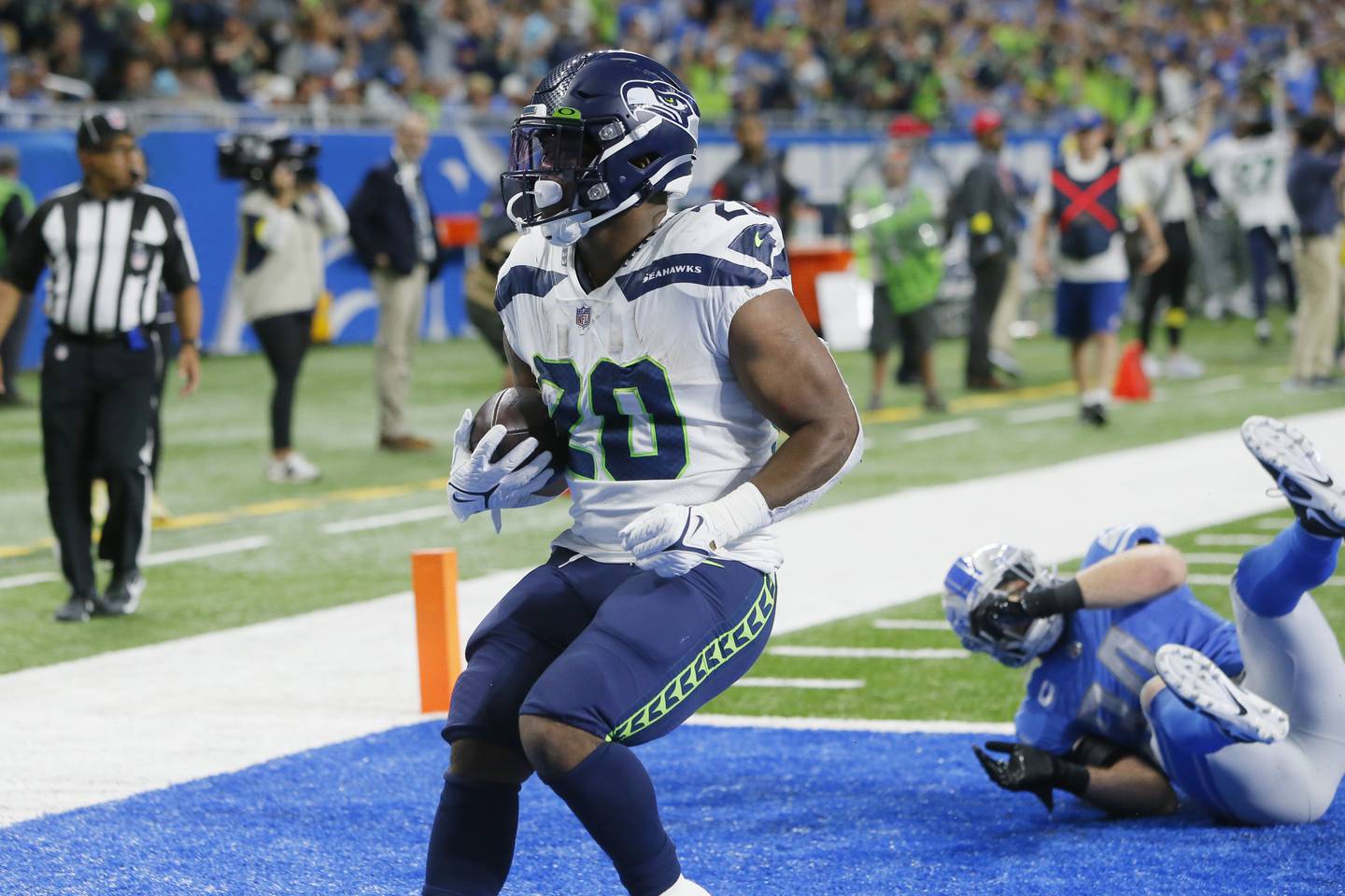 Seahawks running back Rashaad Penny scores on a 36-yard run during the second half against the Lions on Sunday, Oct. 2, 2022, in Detroit.