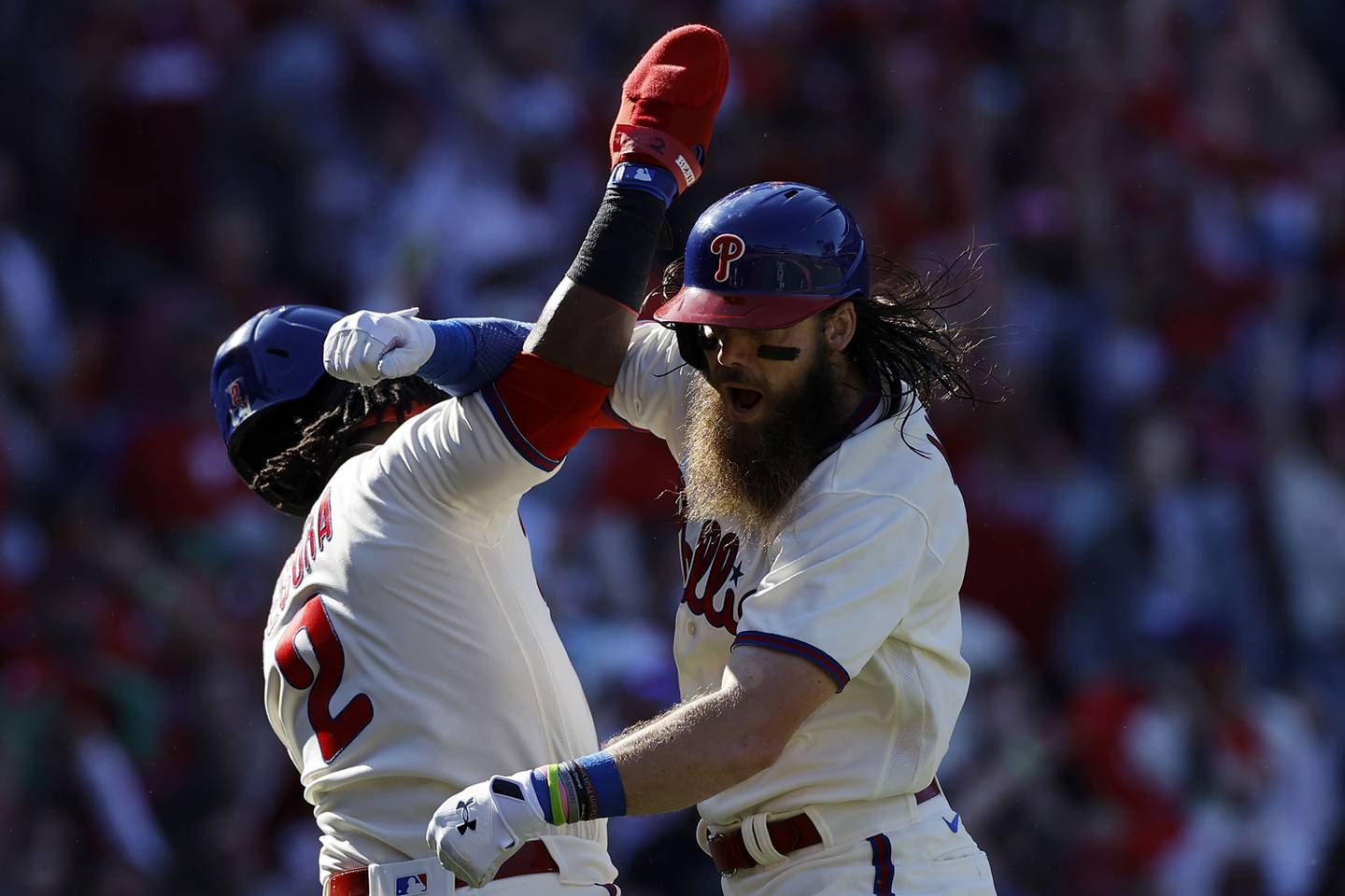 The Phillies' Brandon Marsh, right, celebrates his three-run home run with Jean Segura in the second inning of Game 4 of an National League Division Series on Saturday at Citizens Bank Park in Philadelphia.