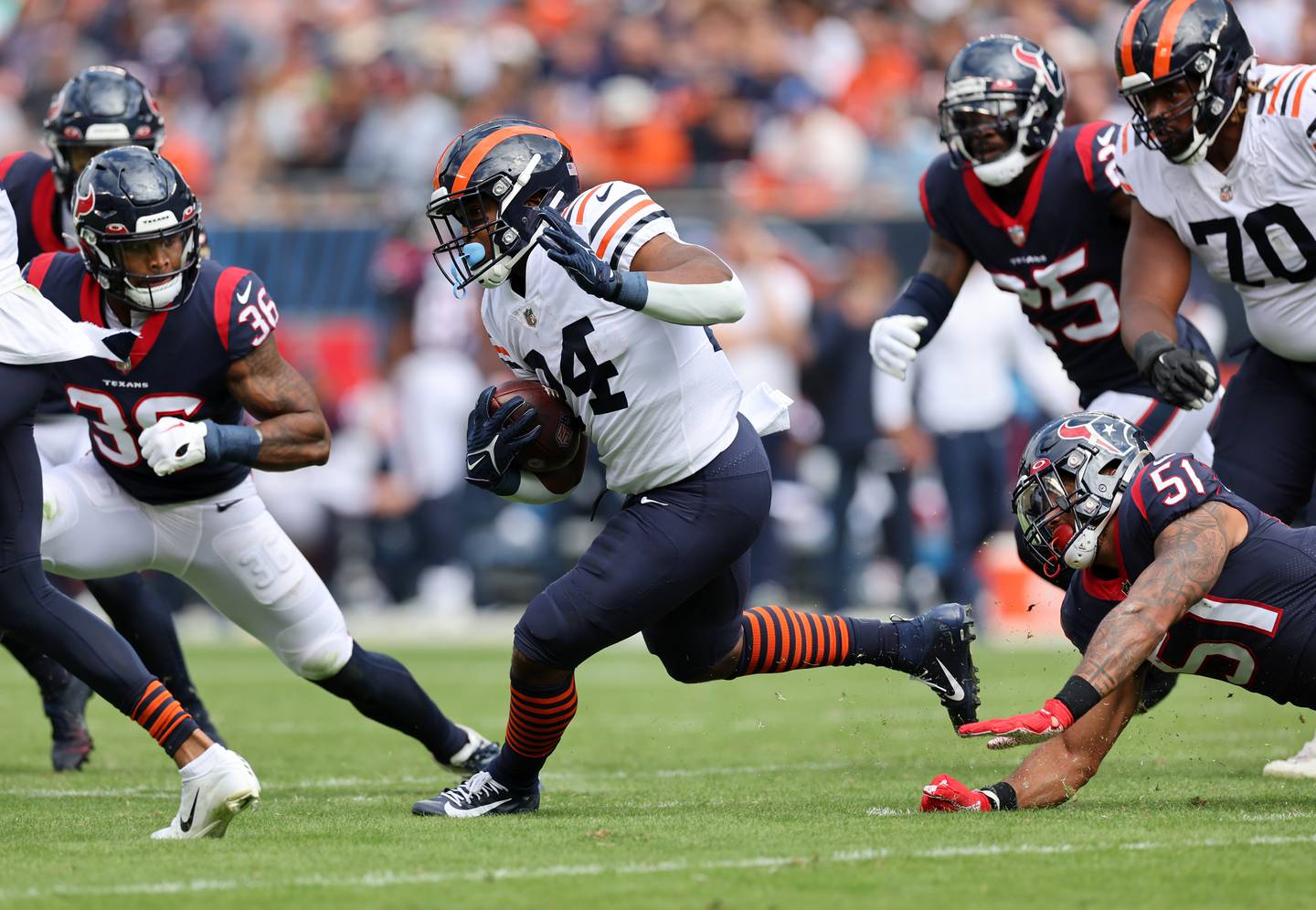 Bears running back Khalil Herbert (24) makes a move against the Texans on Sept. 25, 2022, at Soldier Field.