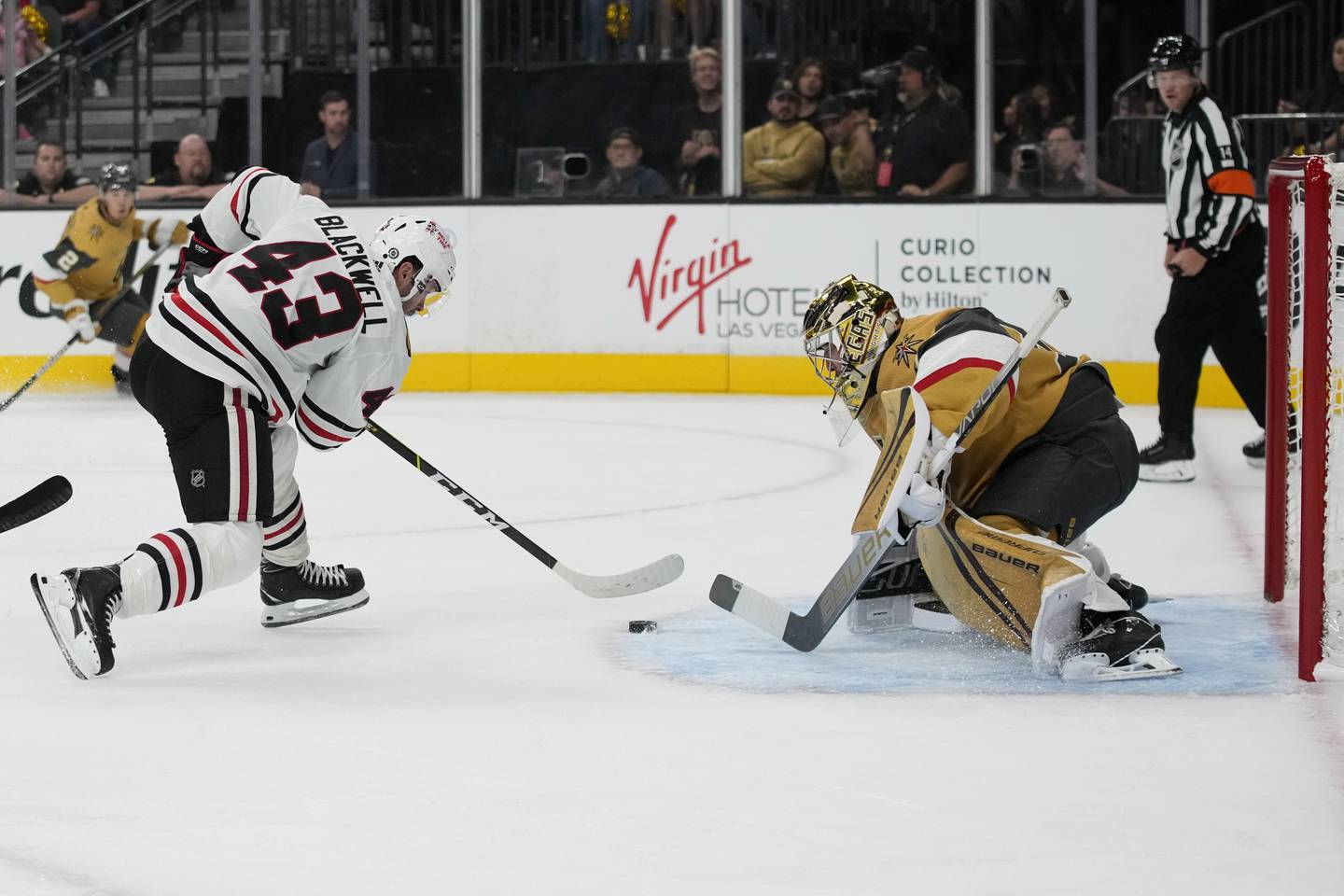 Chicago Blackhawks center Colin Blackwell (43) attempts a shot on Vegas Golden Knights goaltender Logan Thompson (36) during the first period, Oct. 13, 2022, in Las Vegas.