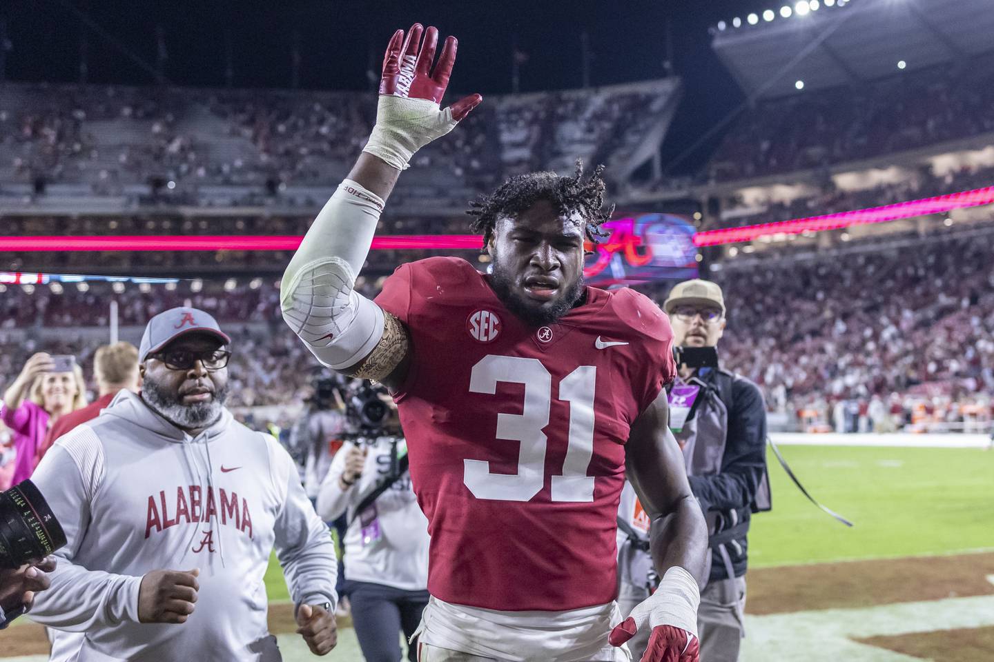 Alabama linebacker Will Anderson Jr. waves to fans as he leaves the field after the team's win over Texas A&M on Saturday in Tuscaloosa, Alabama
