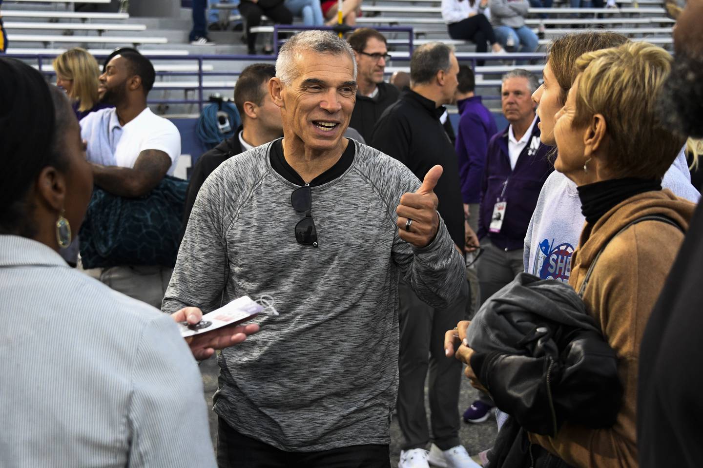 Joe Girardi stands on the sideline before a Northwestern football game on Sept. 24, 2022.