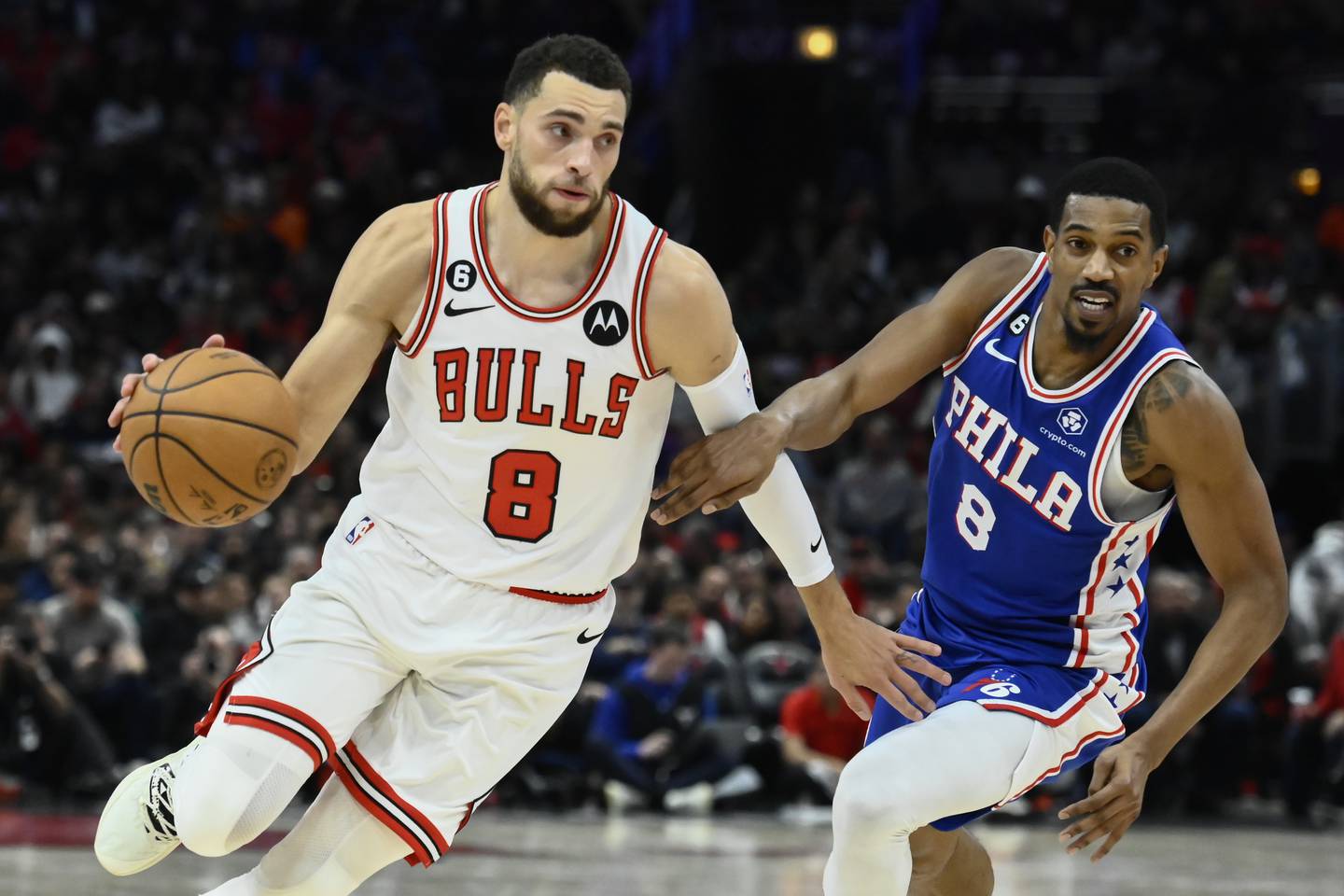 Bulls guard Zach LaVine (8) drives against 76ers guard De'Anthony Melton (8) during the second half Saturday, Oct. 29, 2022, at the United Center.