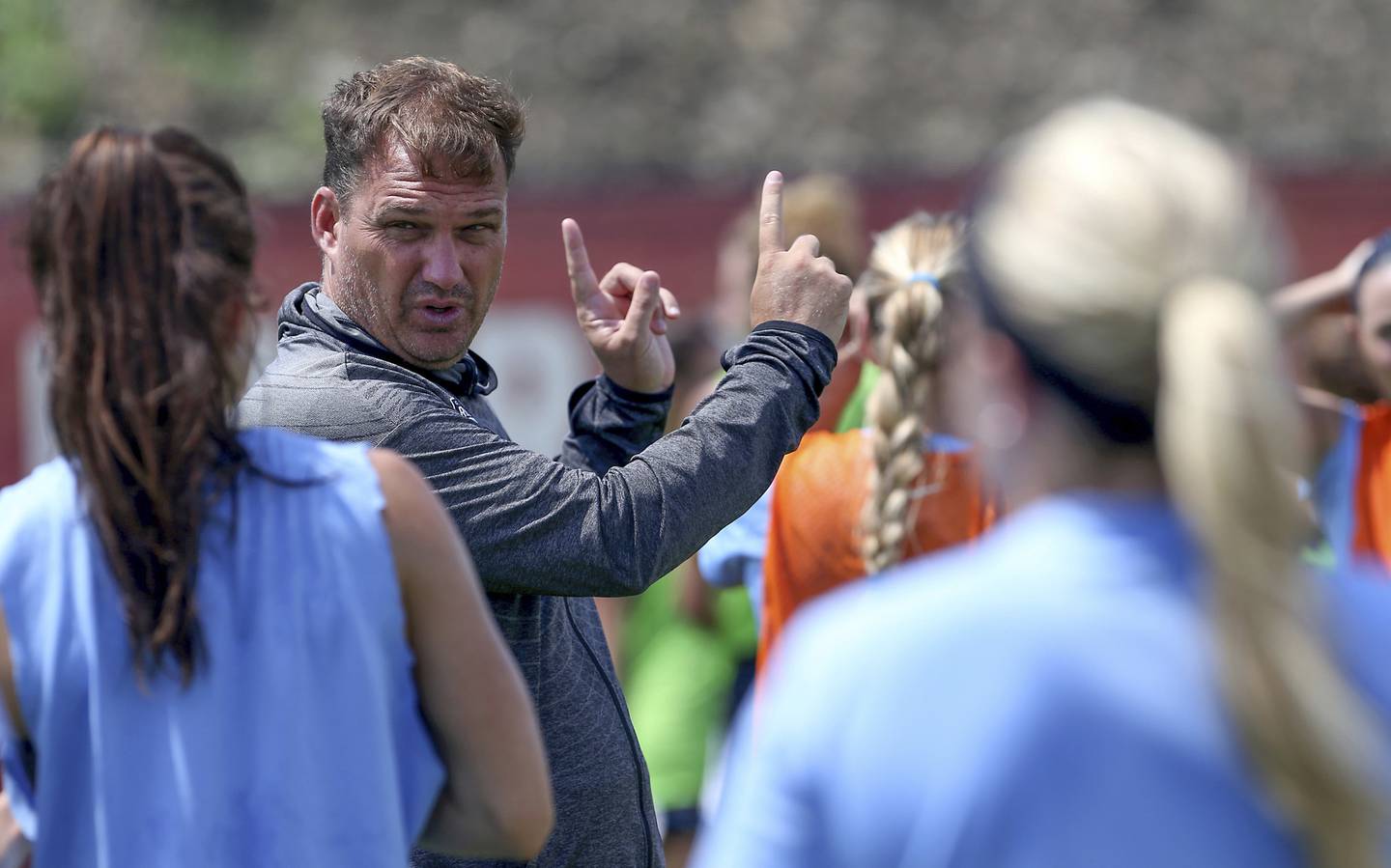 Chicago Red Stars coach Rory Dames talks with his players during a scrimmage near Toyota Park on July 20, 2017, in Bridgeview. 
