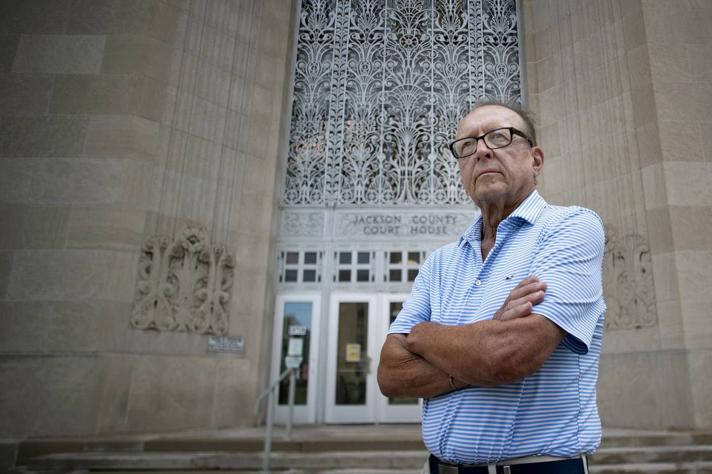 James Bell, shown in August at the Jackson County Courthouse in Kansas City, worked on the Raymond West murder case. Now retired, he said: “It was the only case file I keep, because there was no closure."