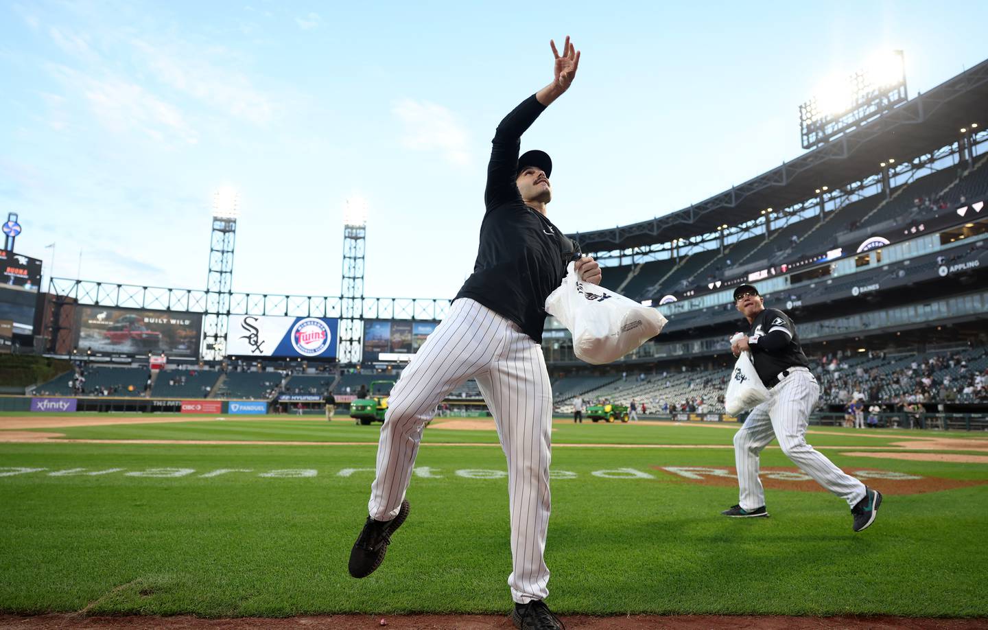 White Sox pitcher Dylan Cease throws T-shirts to fans after a 10-1 loss to the Twins in the season finale Oct. 5, 2022, at Guaranteed Rate Field.