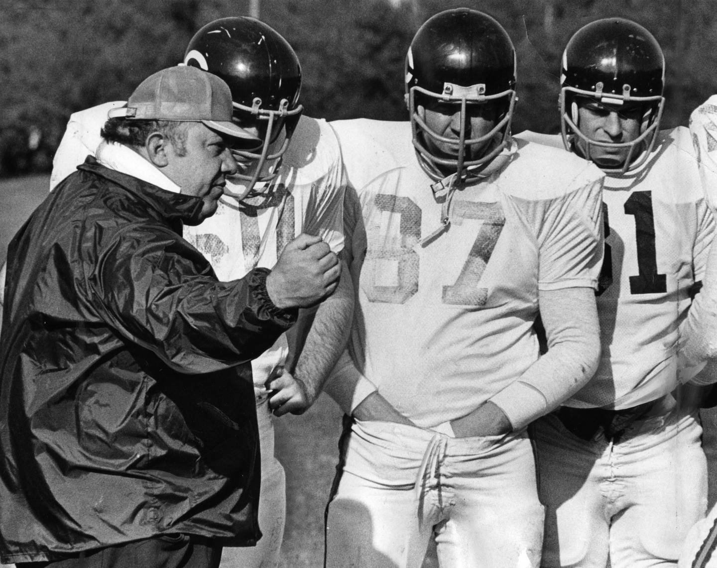 Bears coach Abe Gibron gives some tips to, from left, Bill Stahley, Steve DeLong and Ross Brupbacher on Oct. 25, 1972.
