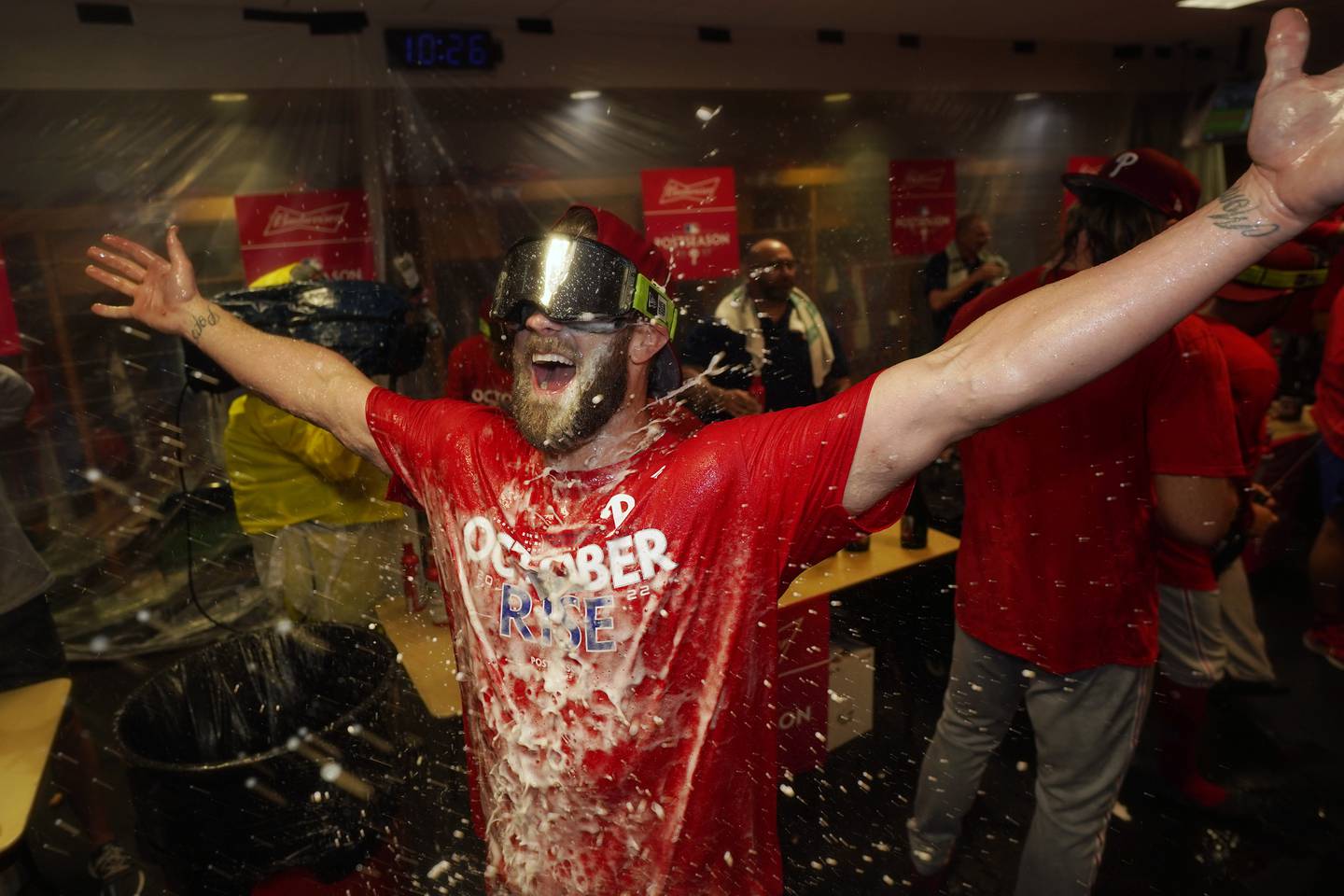 Bryce Harper celebrates after the Phillies beat the Astros to clinch a wild-card playoff spot Monday in Houston. 