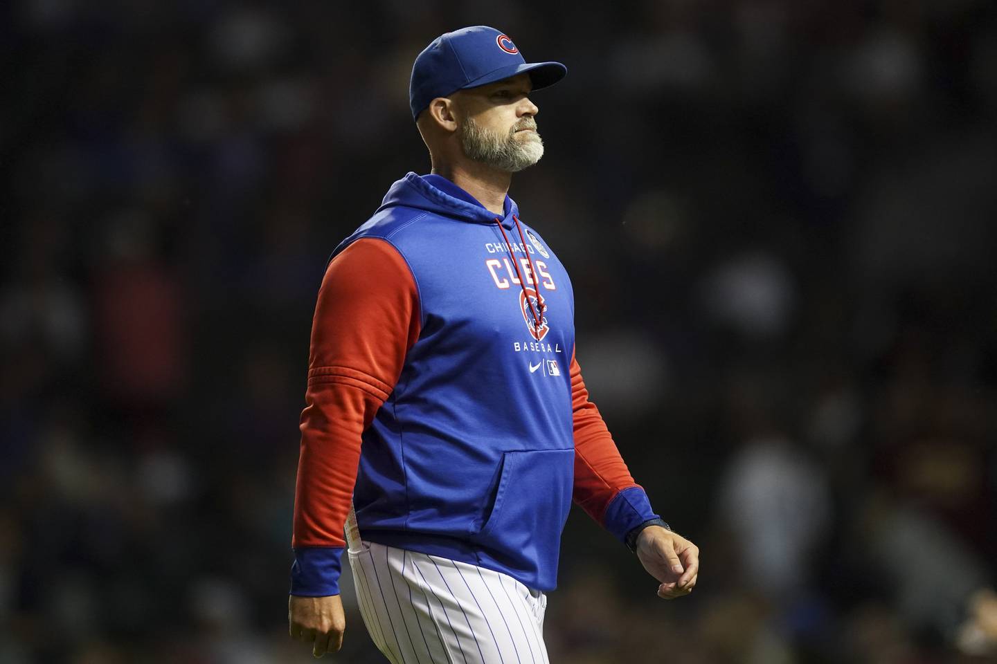 Cubs manager David Ross walks to the dugout during a game at Wrigley Field on June 2, 2022.