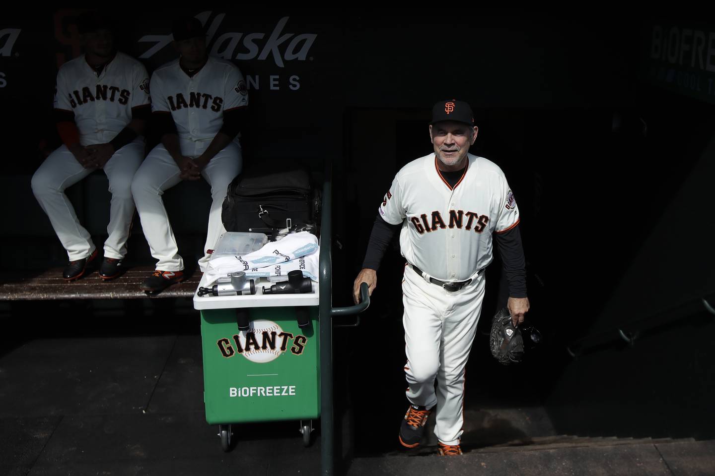 Giants manager Bruce Bochy walks into the dugout before a game against the Dodgers in San Francisco on Sept. 29, 2019.