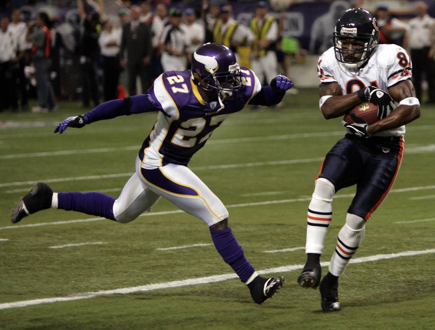 Bears receiver Rashied Davis hauls in the game-winning touchdown pass against the Vikings' Ronyell Whitaker on Sept 24, 2006, in Minneapolis. 