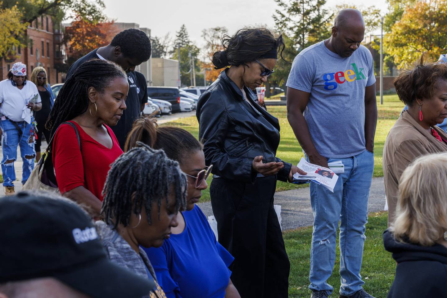 Attendees pray during the rally against gun violence.