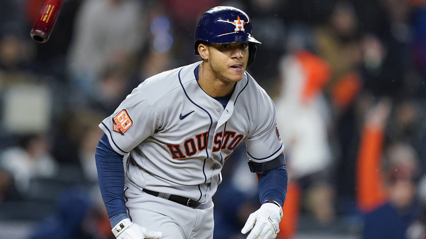 Astros shortstop Jeremy Pena tosses his bat after hitting a three-run home run against the Yankees during the ALCS on Oct. 23, 2022, in New York.
