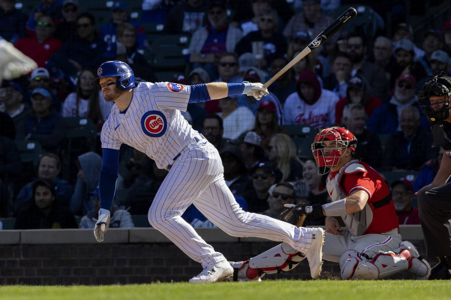 Ian Happ singles to score Seiya Suzuki during the fifth inning on Sept. 29, 2022, at Wrigley Field.