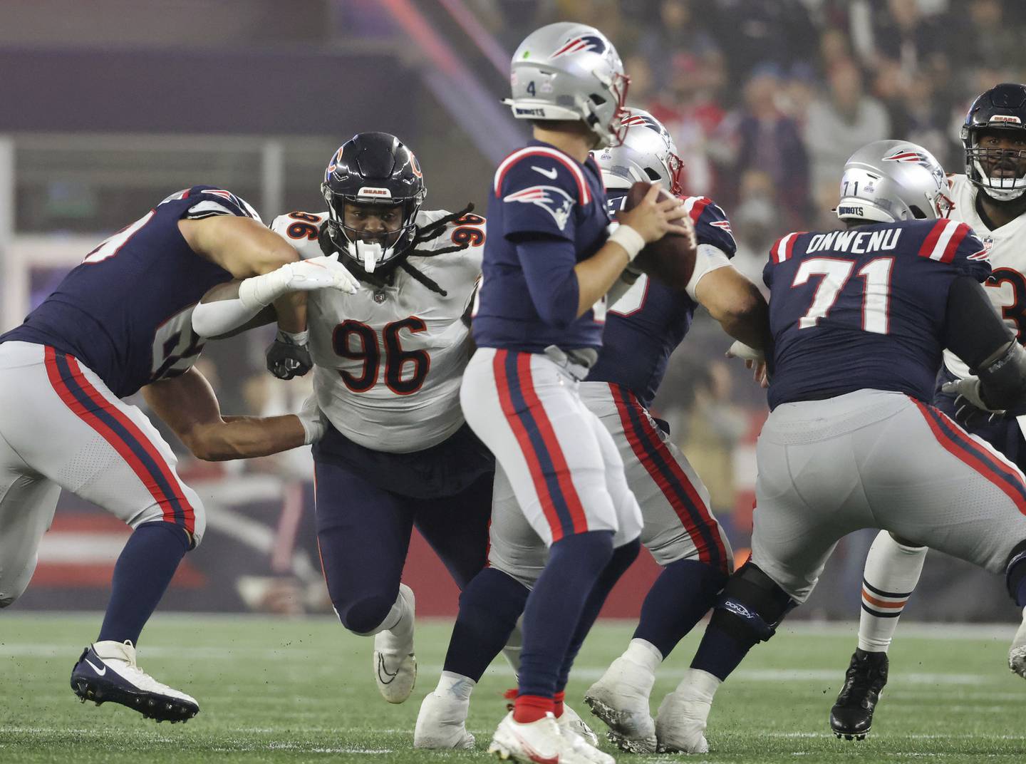 Bears defensive tackle Armon Watts (96) rushes Patriots quarterback Bailey Zappe (4) in the fourth quarter on Monday, Oct. 24, 2022, at Gillette Stadium.
