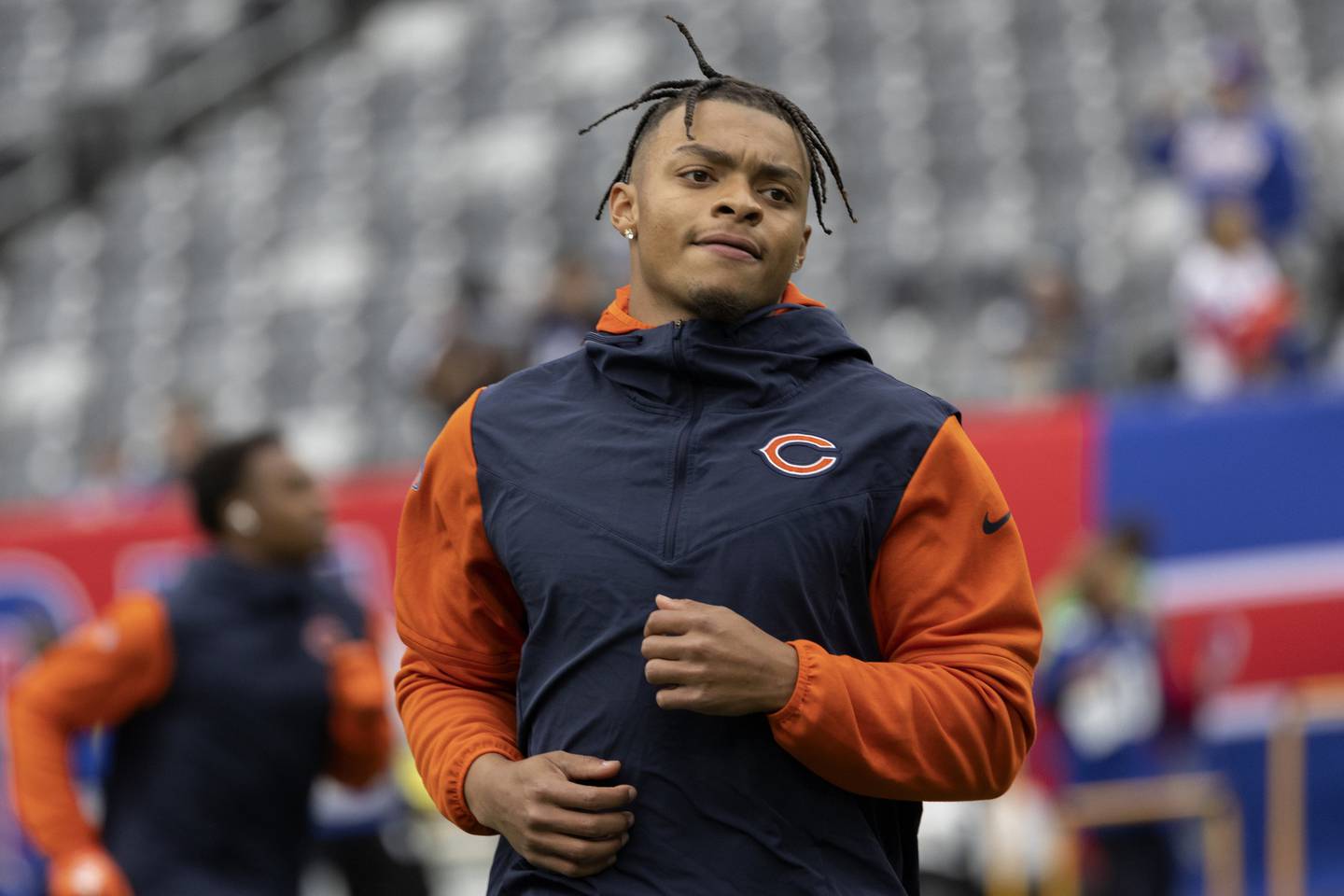 Bears quarterback Justin Fields warms up before the game against the Giants on Oct. 12, 2022.