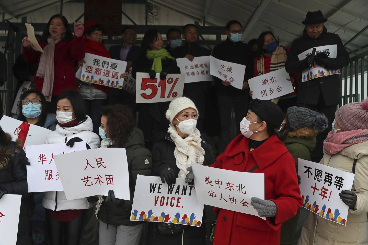 People rally to promote a redistricting map in Chinatown Square last November in Chicago. The city got its first majority-Asian ward from the once-a-decade redistricting.