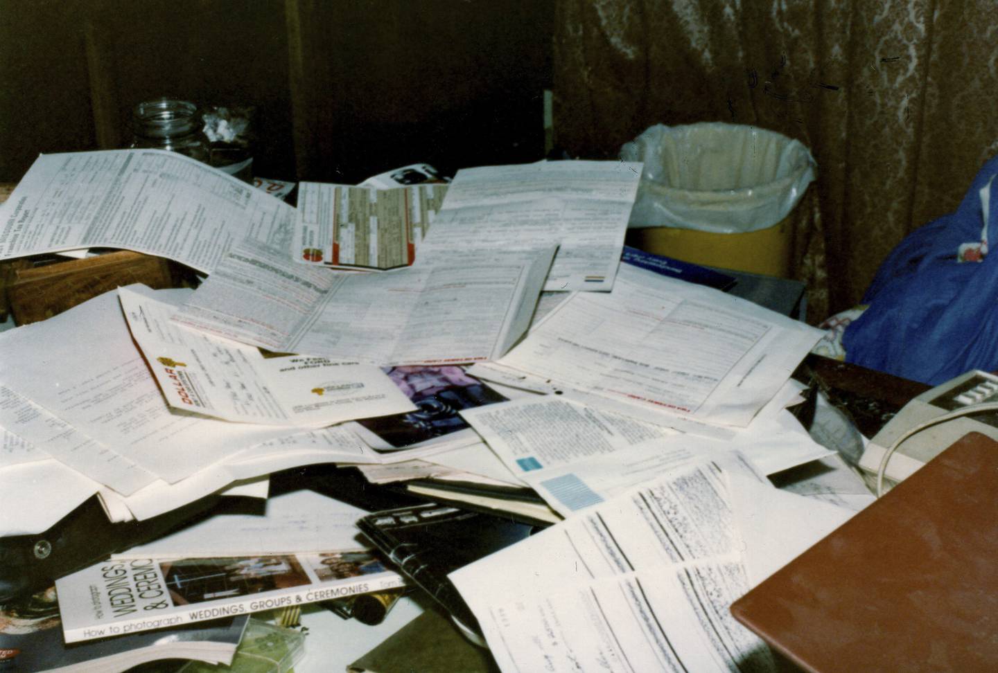 According to FBI reports, authorities searching James Lewis' Kansas City home in 1981 found credit card applications and receipts containing the same names as fraud victims.