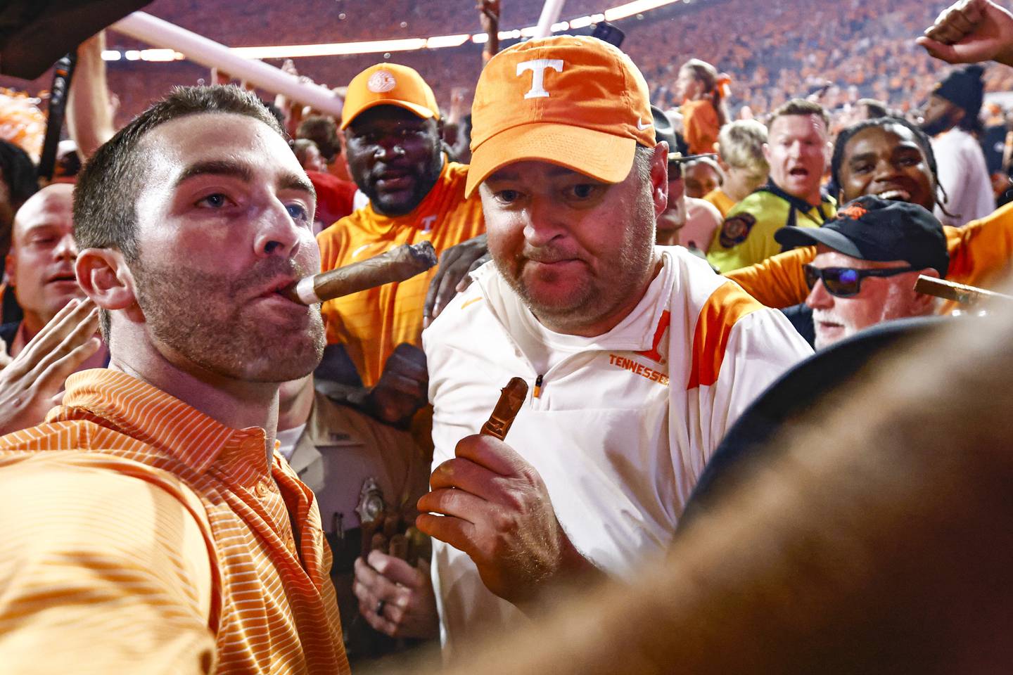 Tennessee coach Josh Heupel, center, leaves the field after his team defeated Alabama 52-49 Saturday in Knoxville, Tenn. 