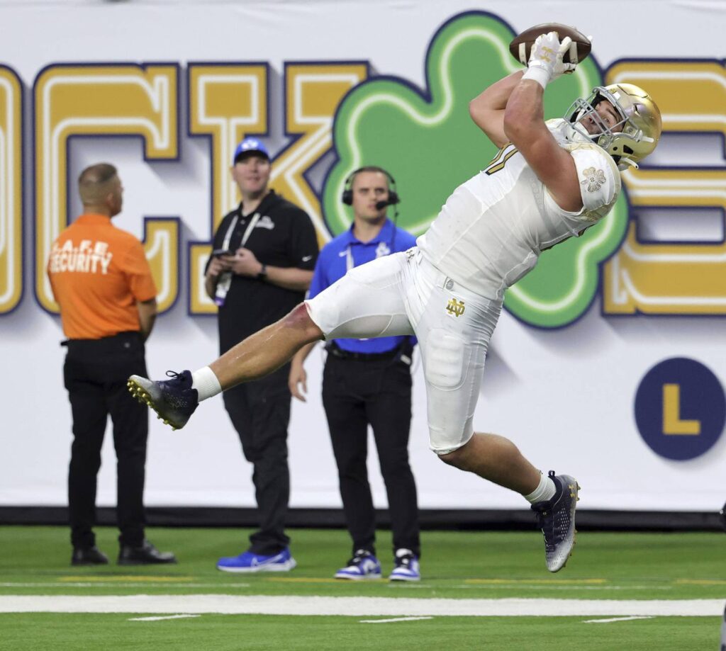 Notre Dame wins its 3rd straight, holding of No. 16 BYU 28-20 in Las Vegas