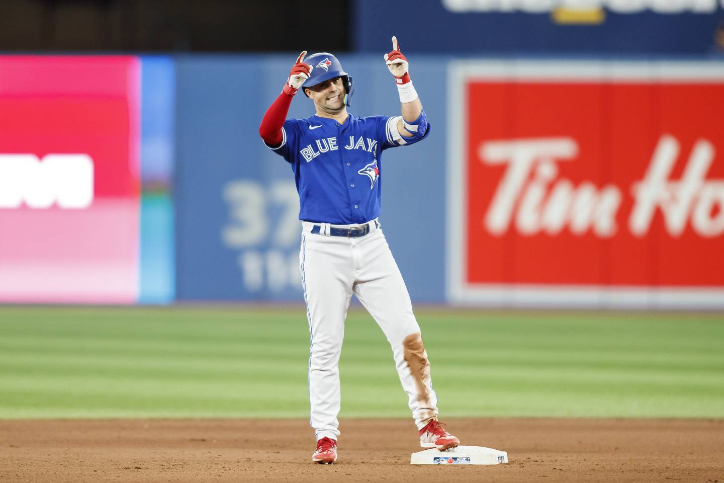 Toronto Blue Jays second baseman Whit Merrifield celebrates his double against the Red Sox on Oct. 2 in Toronto. 