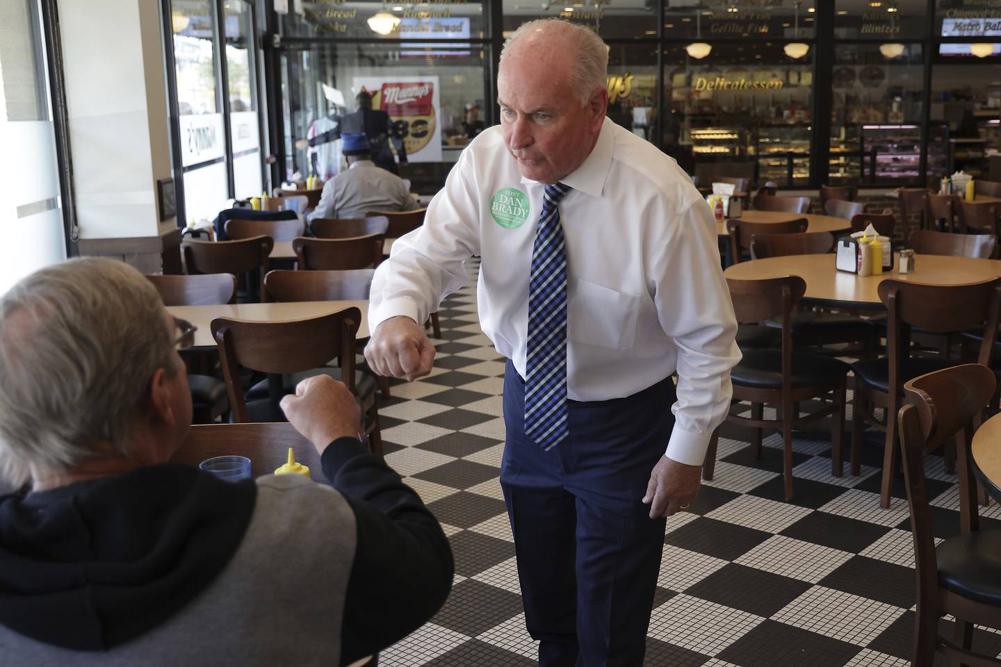 State Rep. Dan Brady, the Republican nominee for secretary of state, campaigns at Manny's Cafeteria & Delicatessen on Jefferson Street in Chicago on Oct. 5, 2022. 