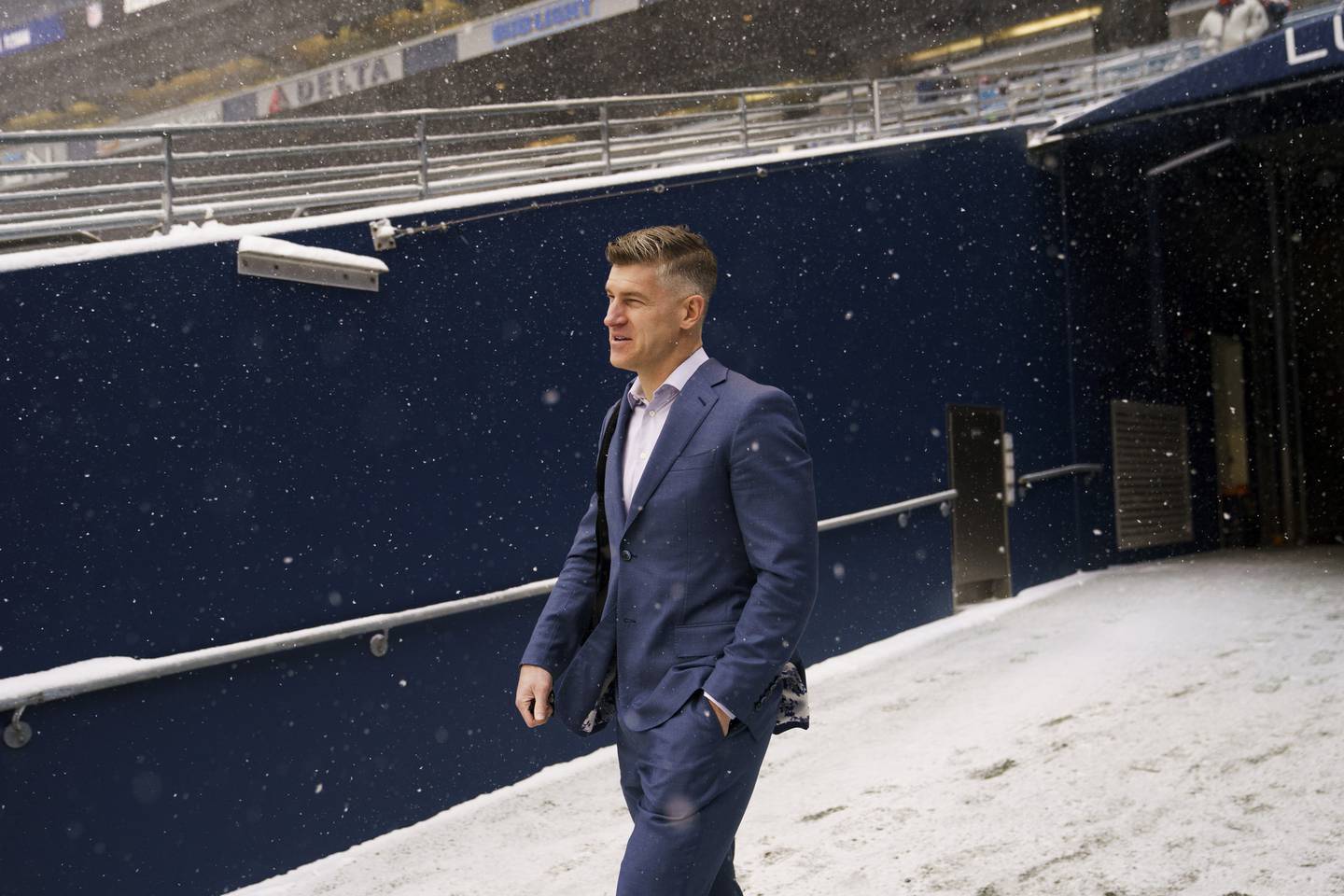 Bears general manager Ryan Pace walks on the field before a game against the Seahawks on Dec. 26, 2021, at Lumen Field in Seattle.