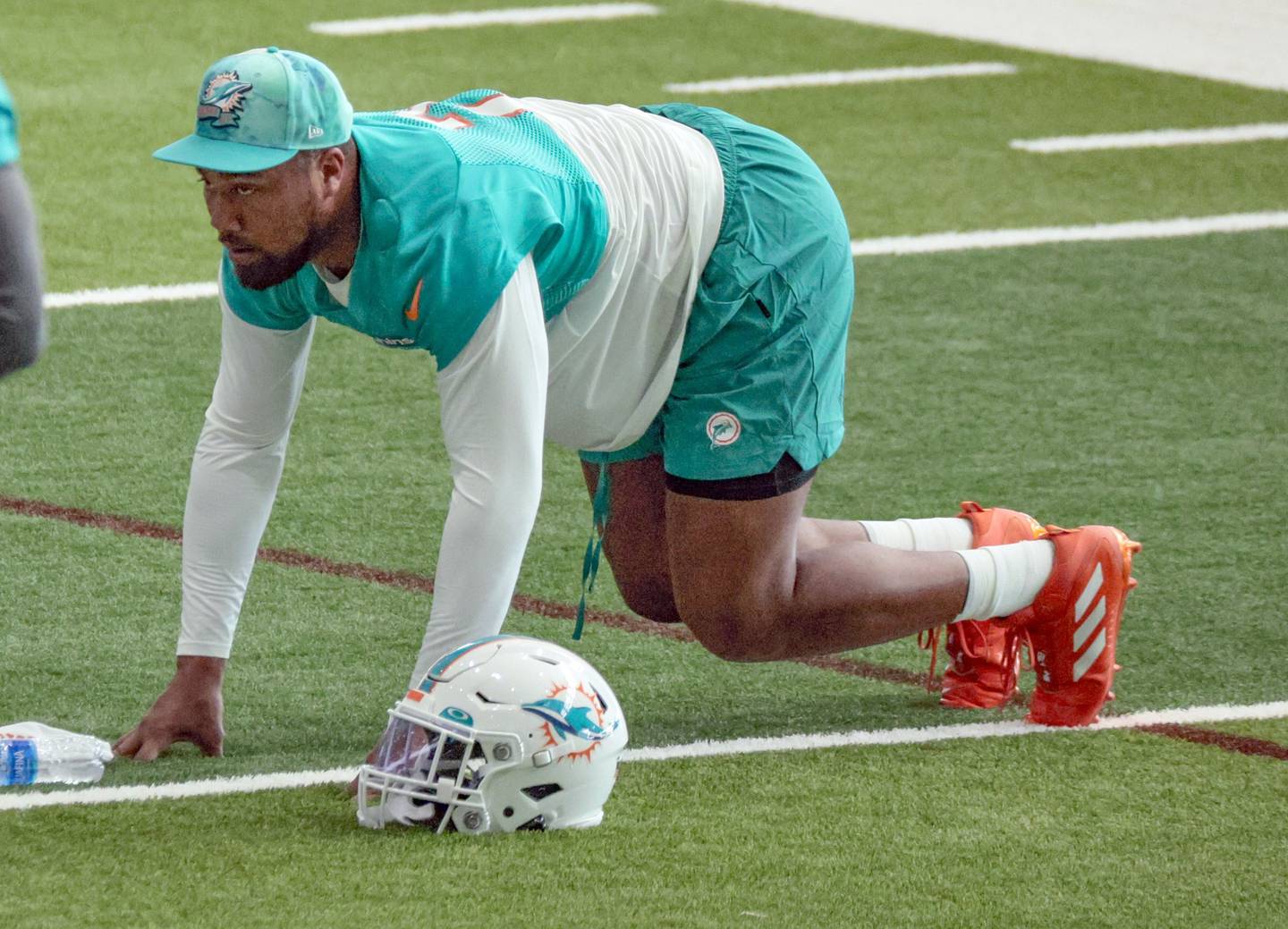 Linebacker Bradley Chubb stretches during Dolphins practice Wednesday in Miami Gardens, Fla. The Dolphins acquired Chubb on Tuesday in a trade with the Broncos.