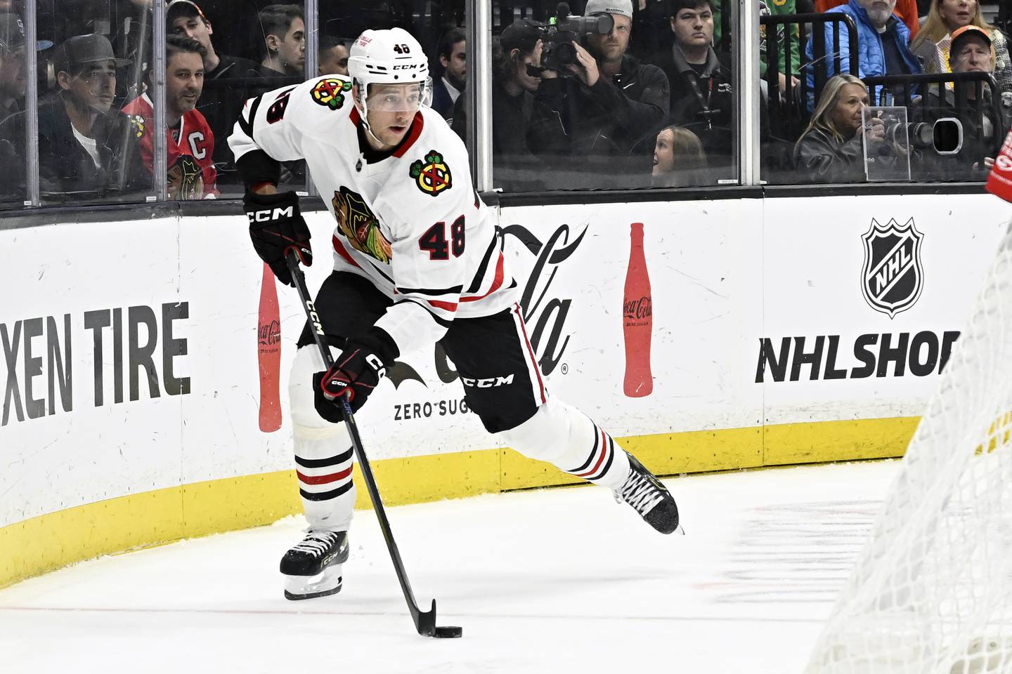 Blackhawks defenseman Filip Roos controls the puck during the first period against the Ducks on Nov. 12, 2022.
