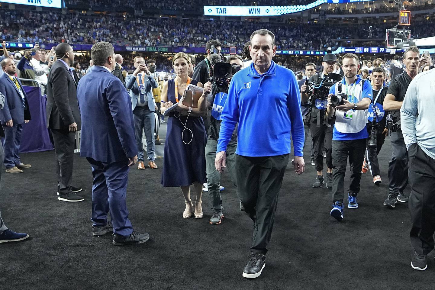 Duke coach Mike Krzyzewski leaves the court after a loss to North Carolina in the Final Four on April 2, 2022, in New Orleans.