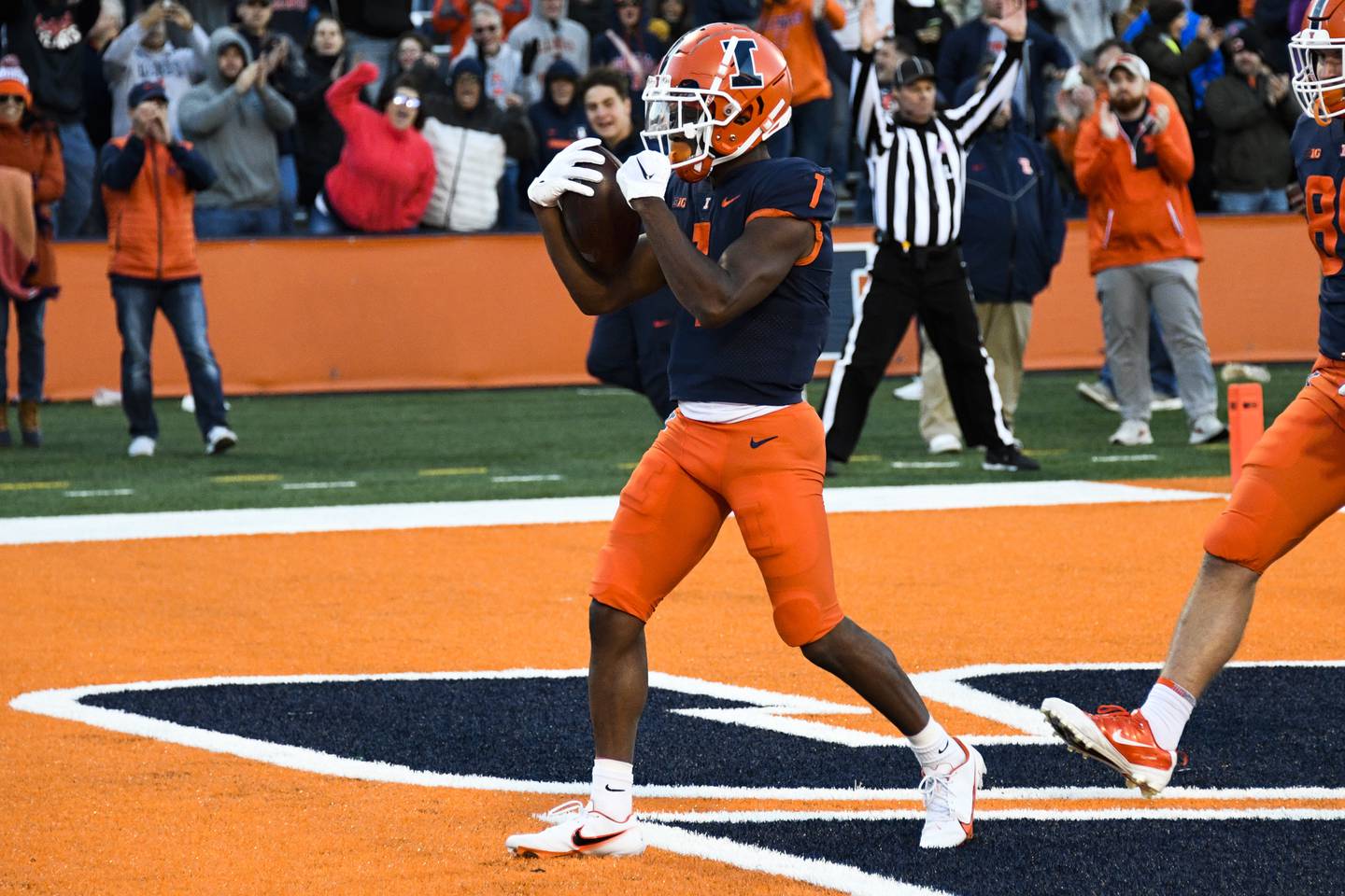 Illinois wide receiver Isaiah Williams celebrates after scoring a touchdown against Michigan State during the second half Saturday in Champaign. 