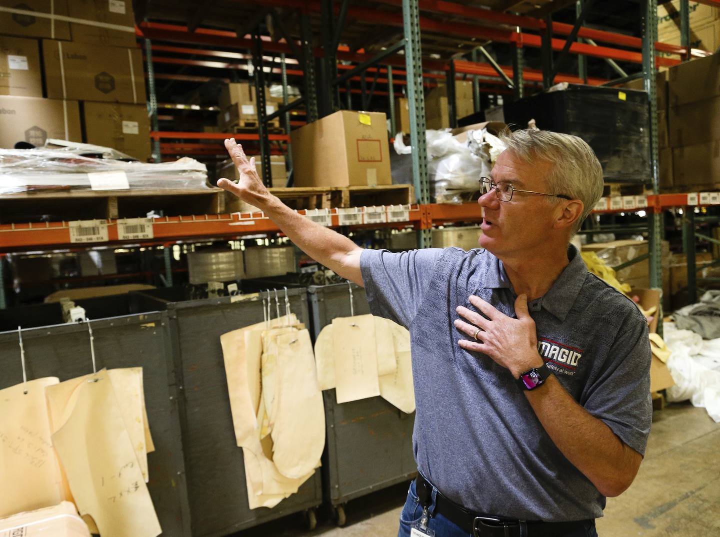 Dave Forberg, Magid Safety's vice president of operations, leads a tour around Magid's manufacturing facility and warehouse at their Romeoville headquarters on Sept. 8, 2022.