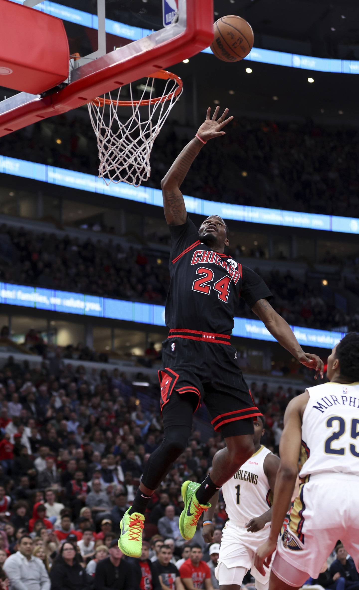 Bulls forward Javonte Green (24) dunks the ball in the second half against the Pelicans on Wednesday at the United Center. 