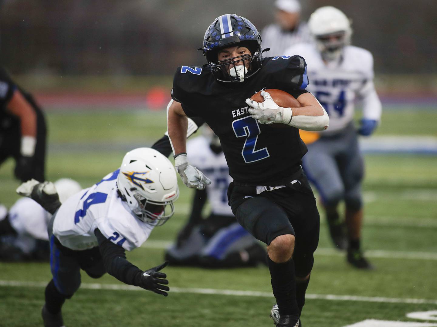 Lincoln-Way East’s James Kwiecinski (2) runs for a touchdown against Warren during a Class 8A state quarterfinal game in Frankfort on Saturday, Nov. 12, 2022.