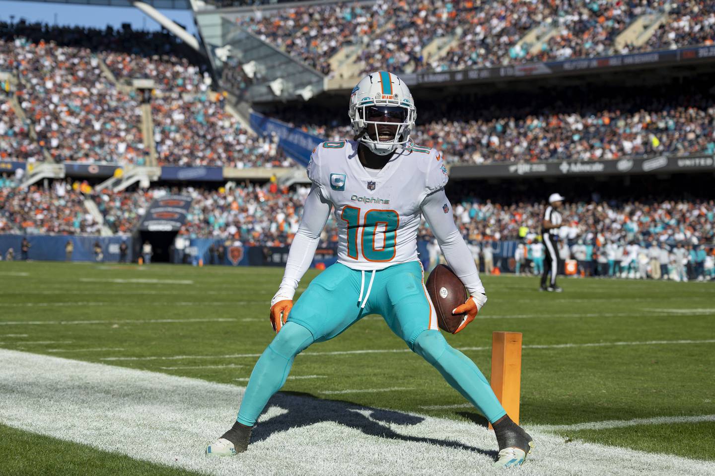 Dolphins wide receiver Tyreek Hill (10) celebrates a touchdown reception against the Bears in the second quarter Sunday at Soldier Field. 