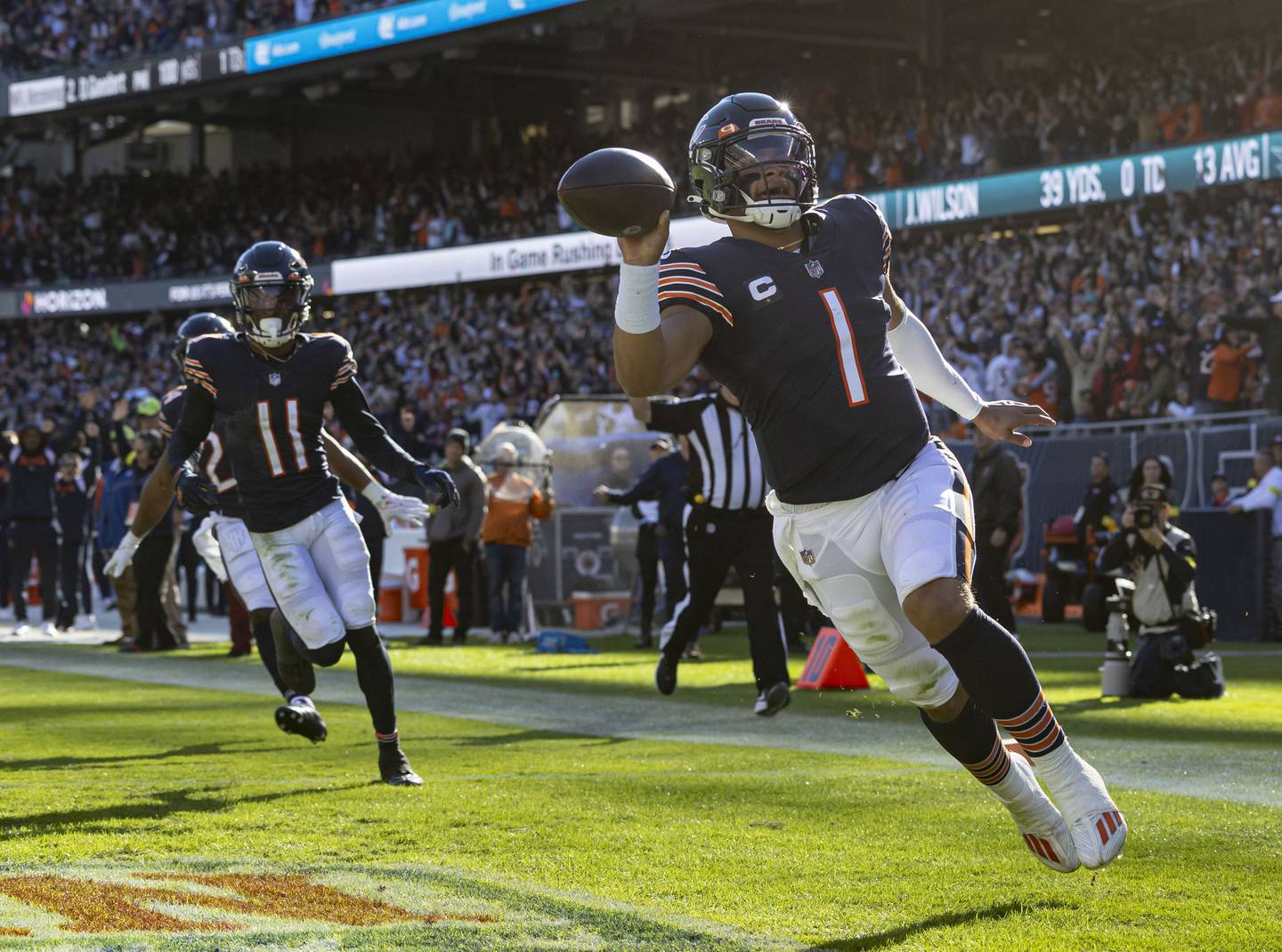 Bears quarterback Justin Fields runs for a 61-yard touchdown in the third quarter at Soldier Field on Nov. 6, 2022.