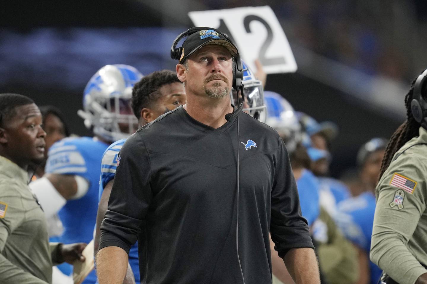 Lions coach Dan Campbell looks toward the scoreboard during the first half of a game against the Packers on Sunday in Detroit. The Lions won 15-9. 