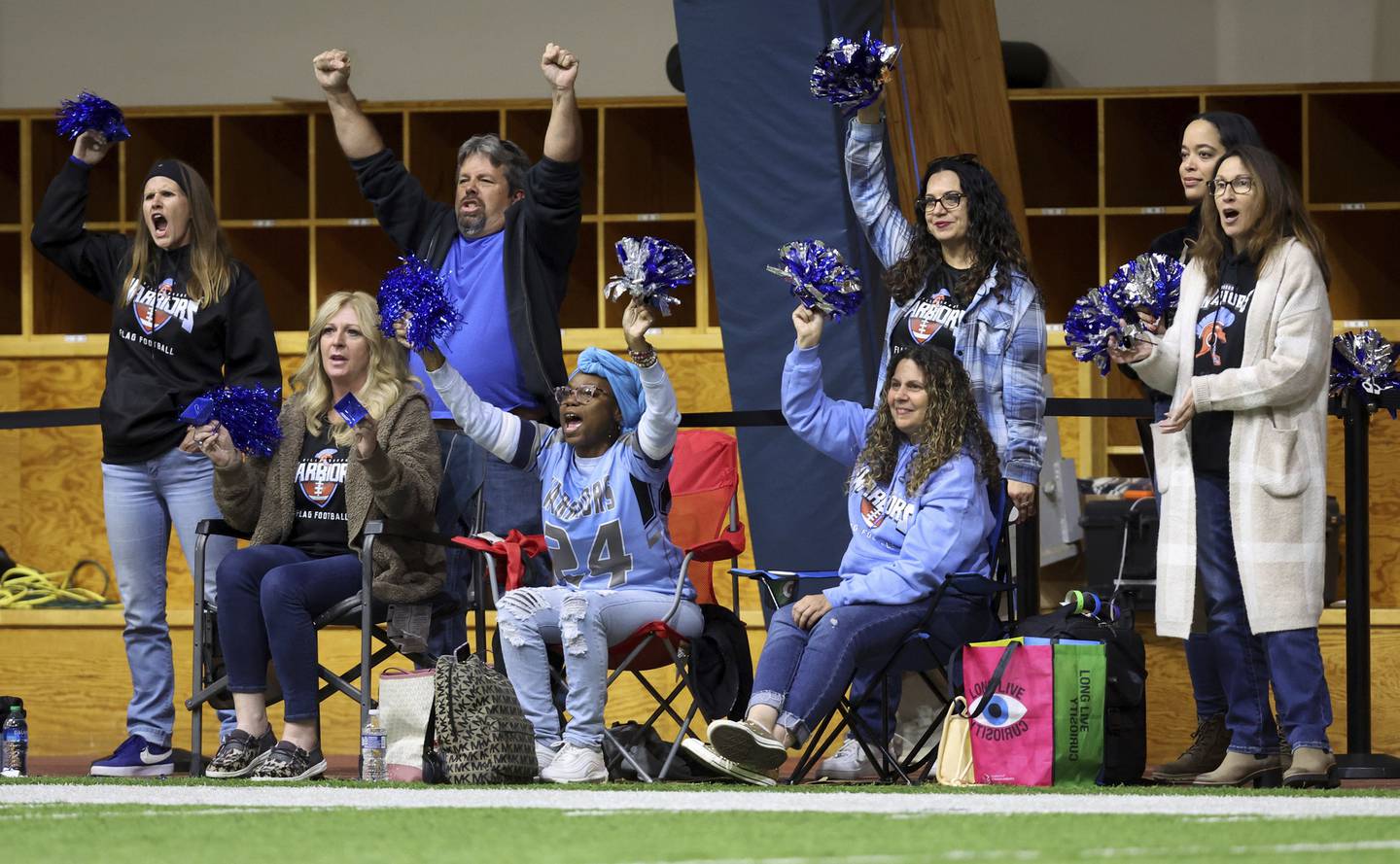 Willowbrook High School parents cheer during the championship game against Taft High School at Halas Hall in Lake Forest on Oct. 29, 2022.  