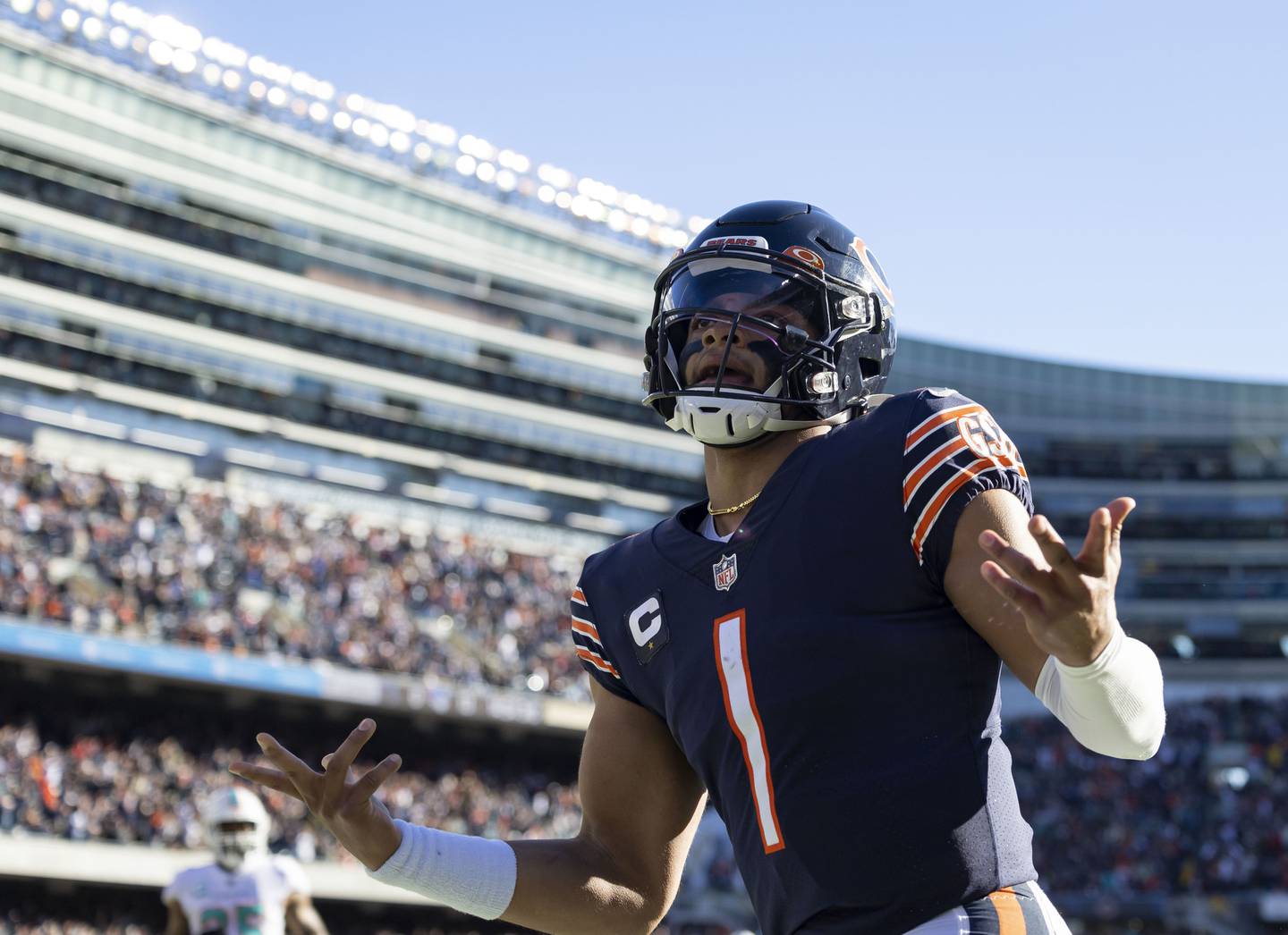 Chicago Bears quarterback Justin Fields celebrates a 61-yard touchdown run in the third quarter, Nov. 6, 2022, at Soldier Field.