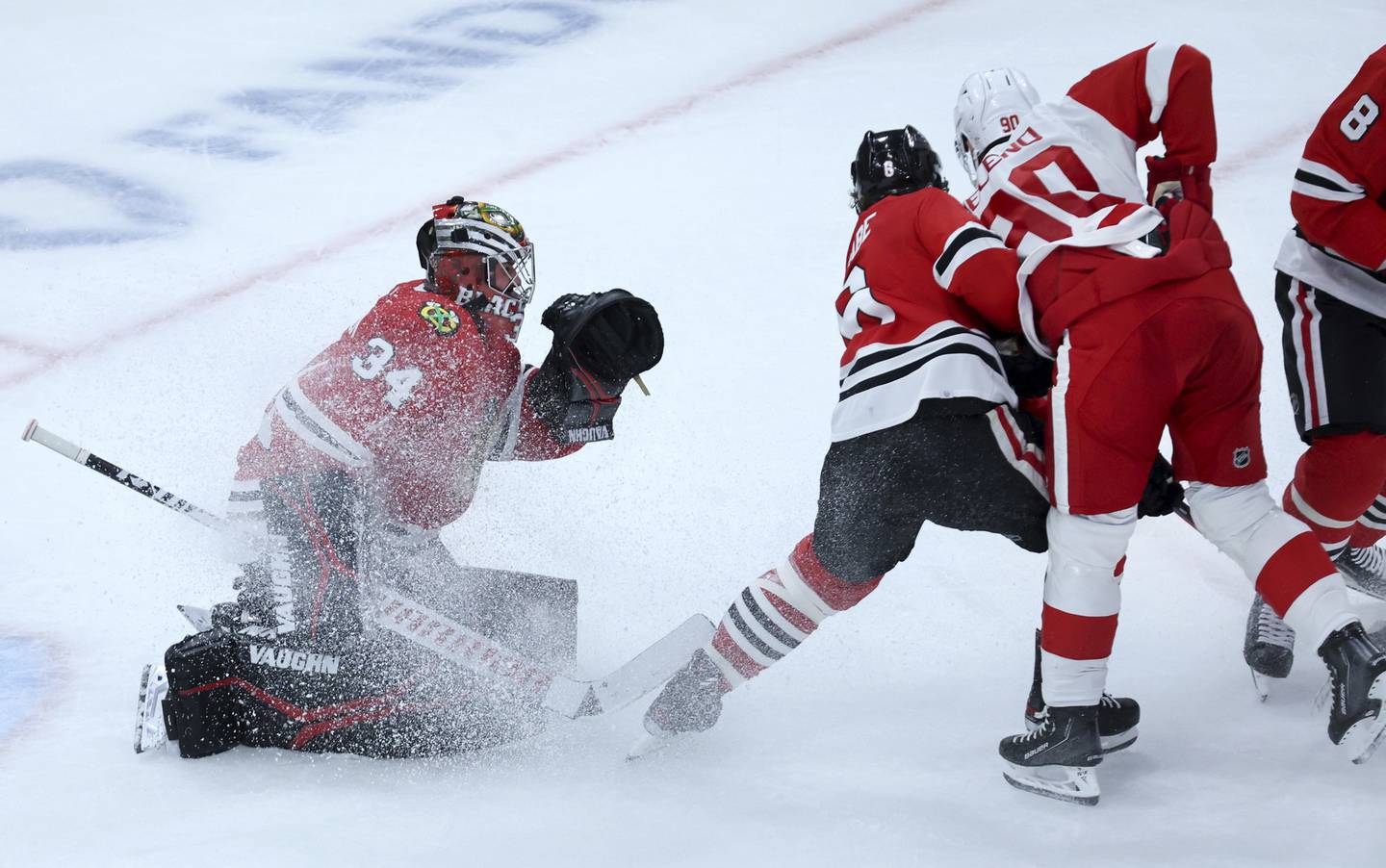 Chicago Blackhawks goaltender Petr Mrázek (34) defends the goal in the second period of the Blackhawks home opener against the Detroit Red Wings, Oct. 21, 2022, at the United Center,